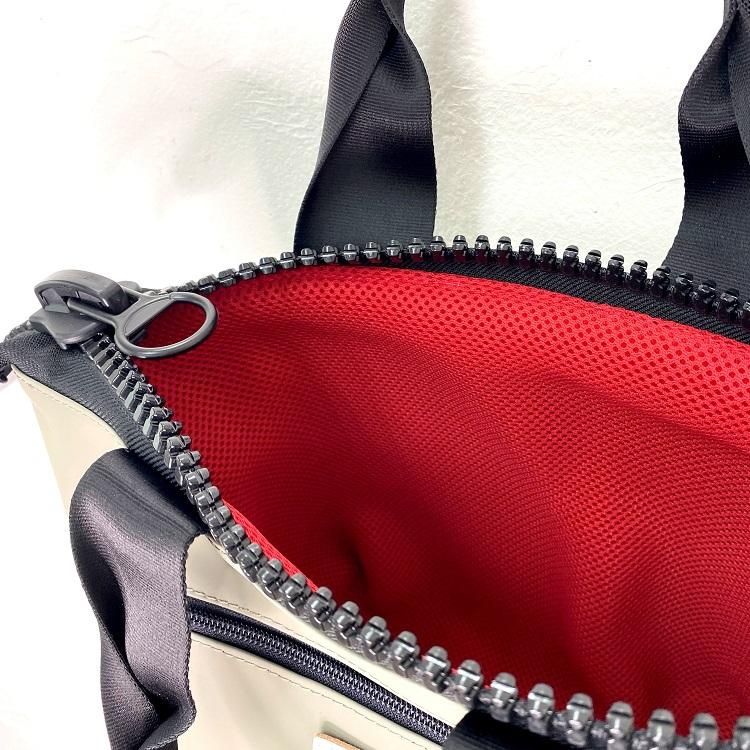 Lahella ilma ja teras? Big zipper Round bag ― ラヘラゴルフ